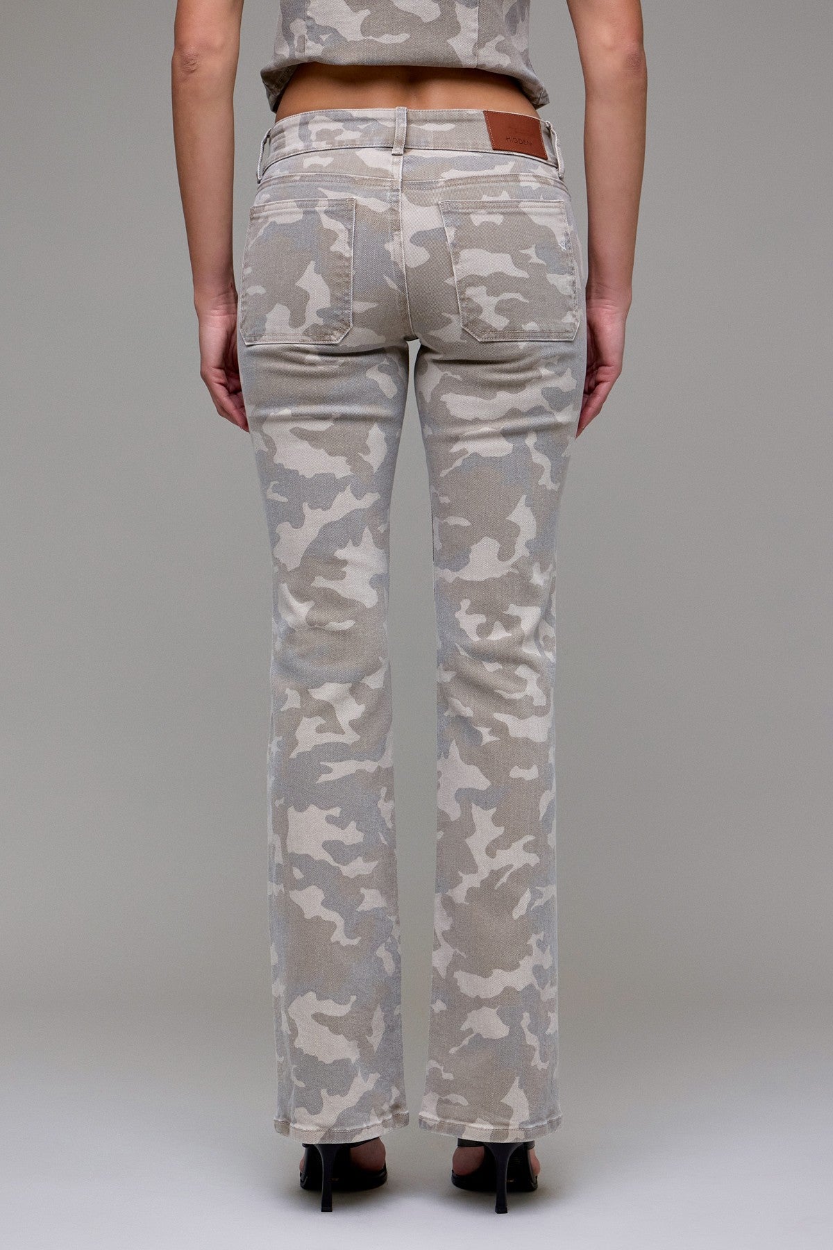 TAN CAMO LOW RISE BOOTCUT JEANS