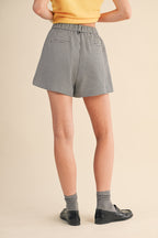 BLACK HOUNDSTOOTH PLEATED SHORTS